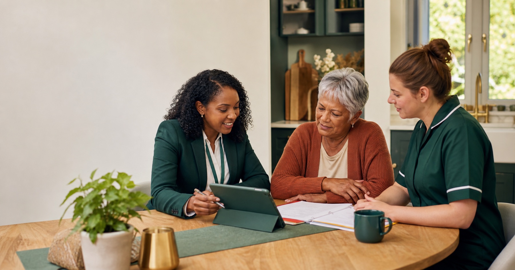 Care Plan Audit Checklist: What CQC Finds When Records Are Out of Date Quality lead reviewing a homecare plan with an older person and care worker